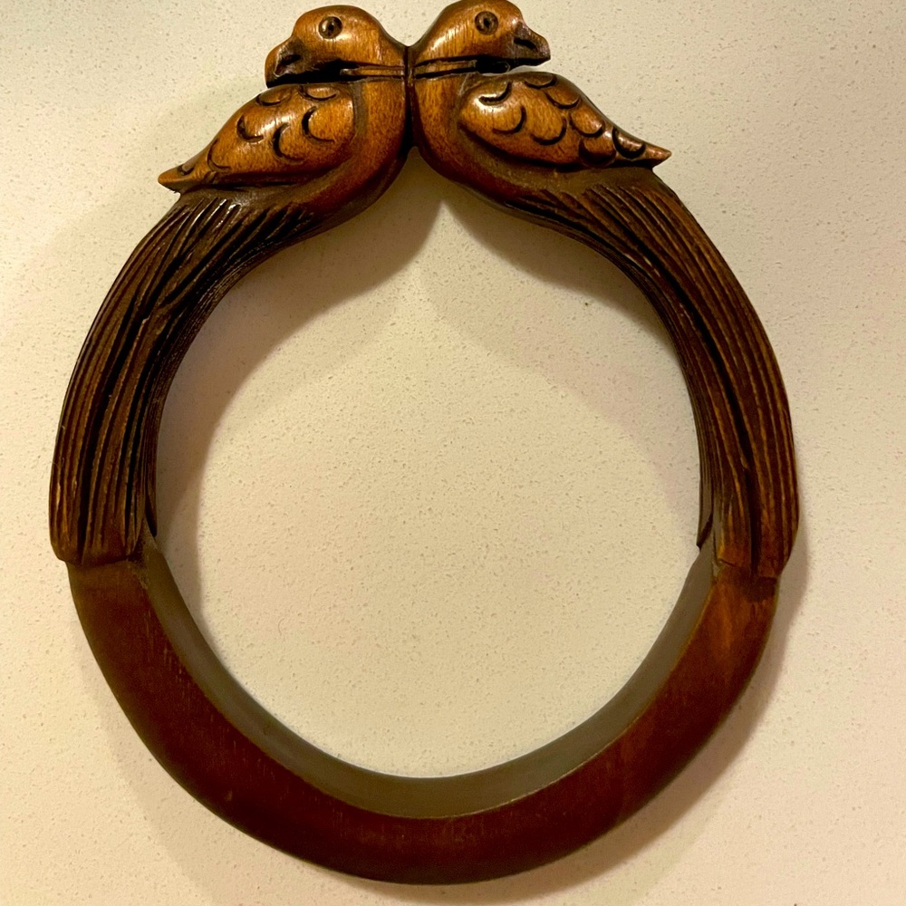 Hand carved wooden bangle with bird detailing